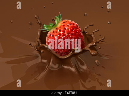 Strawberry falling into liquid chocolate splashing.  Close up view. Stock Photo