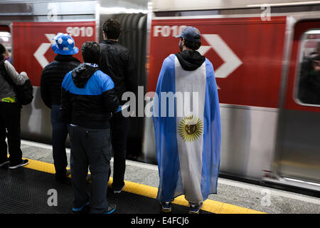 São Paulo, Brazil. 9th July, 2014. Argentina fans wait for a train in the Itaquera train station after the semifinal World Cup game between Argentina and the Netherlands in São Paulo, Brazil on July 9, 2014. Argentina won the game in the shootout by 4-2 and made to final. Credit:  Tiago M. Chiaravalloti/Pacific Press/Alamy Live News Stock Photo