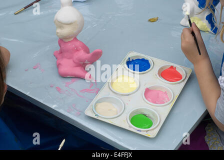 Paint tray with children at art class. Stock Photo