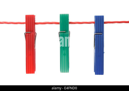 Three plastic Clothespin in a Row Isolated on white background Stock Photo