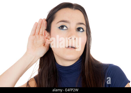 Close-up of a Girl trying to listen isolated on white background Stock Photo