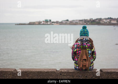 Rear view of a woman looking forward future Stock Photo