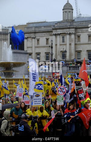 London, UK. 10th July 2014. Strikers from unions NUT, PCS, Unison, Unite and UCU among others stage a march through London ending with a rally in Trafalgar Square Credit:  Rachel Megawhat/Alamy Live News Stock Photo