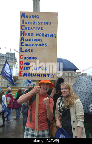 Trafalgar Square London UK 10th July 2014. Demonstrators shout and wave flags and banners as thousands of public sector workers protested against low pay in a day of action. After a procession through Central London the rally stopped in Trafalgar Square for a series of speeches by union officials. Credit Julian Eales/Alamy Live News Stock Photo