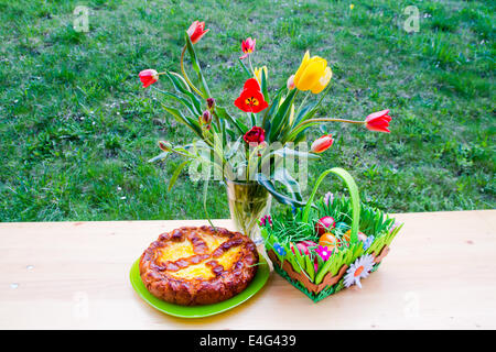 TRaditional easter romanian cakes - cozonac and pasca - outdoors image Stock Photo