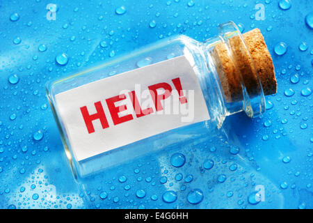 Help message in a bottle Stock Photo