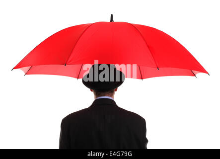 Businessman holding a red umbrella Stock Photo