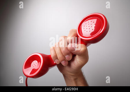 Red telephone receiver Stock Photo