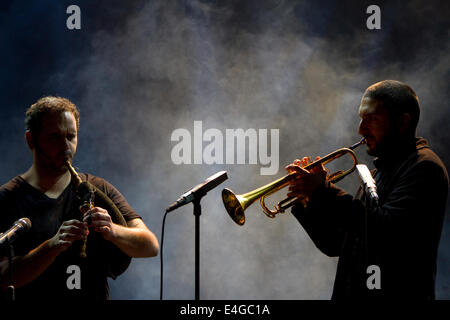 French trumpet player Ibrahim Maalouf (right) performing with a bagpipes player at Torino Jazz Festival. Stock Photo