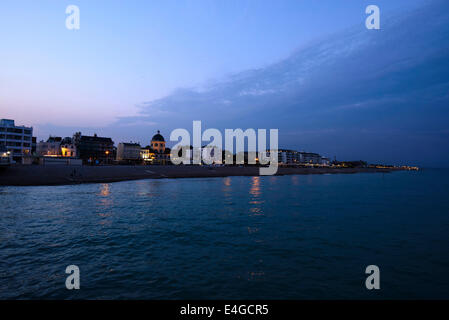 Worthing seafront in the evening light showing the landmarks of The Dome and Splash Point. Stock Photo