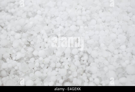 Settled hailstones after a sudden heavy storm. Stock Photo