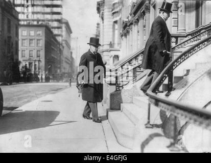 John Pierpont Morgan, 1837-1913 Summary: Full length, about to walk up steps, (at Bliss funeral), facing right, 1911 Stock Photo