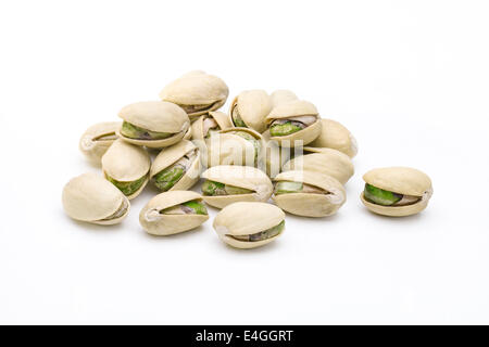 Pistachio nuts and seeds isolated on white background Stock Photo