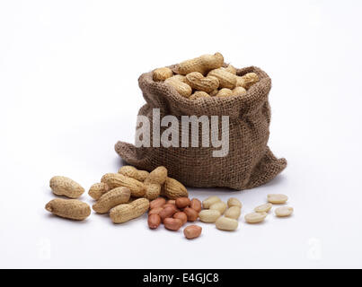 Peanuts in the bag sack isolated on white background Stock Photo