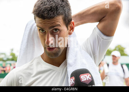 Novak Djokovic practices on Court no.4  The Championships Wimbledon 2014 The All England Lawn Tennis & Crocquet Club Wimbledon Stock Photo
