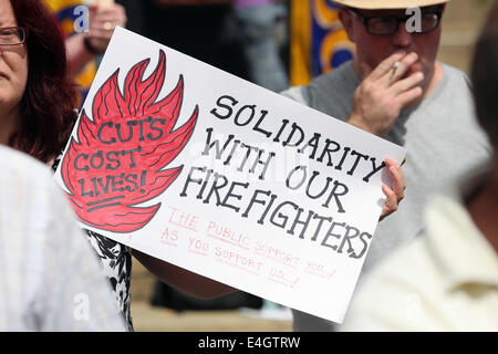 Swansea, UK. 10th July, 2014.  Pictured: at Castle Square Gardens, Swansea, south Wales.  Re: Strikes are taking place across the UK in a series of disputes with the government over pay, pensions and cuts, with more than a million public sector workers expected to join the action.  Firefighters, librarians and council staff are among those taking part from several trade unions, with rallies taking place across the UK. Credit:  D Legakis/Alamy Live News