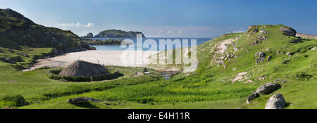 Ancient blackhouse or celtic croft preserved and restorend on a beach on Lewis in the Ouder Hebrides of Scotland Stock Photo