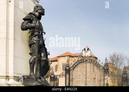 UK, Colchester, the statue of St. George, part of the war memorial by HC Fehr in 1919, outside the entrance to the castle/park. Stock Photo