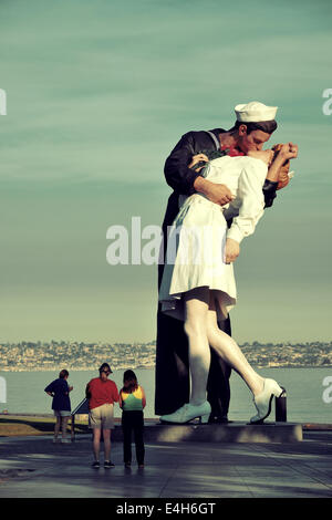 San Diego, CA - MAY 18: Unconditional Surrender sculpture at sea port on May 18, 2014 in San Diego. By Seward Johnson, the statue resembles the photograph of V–J day in Times Square Stock Photo