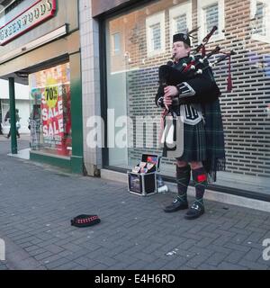 Scenes from Altrincham Market: The bag piper Stock Photo