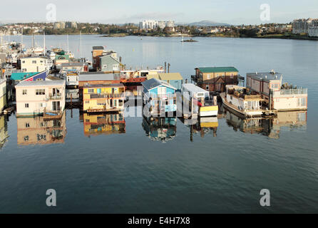 Floating house boats in Victoria Harbor Stock Photo