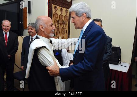 Kabul, Afghanistan. 11th July, 2014. US Secretary of State John Kerry meets with Afghan presidential candidate Ashraf Ghani at the U.S. Embassy July 11, 2014 in Kabul, Afghanistan. Kerry is in Afghanistan to help resolve the country's disputed presidential election. Credit:  Planetpix/Alamy Live News Stock Photo