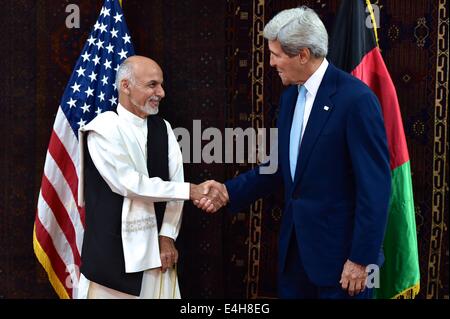 Kabul, Afghanistan. 11th July, 2014. US Secretary of State John Kerry meets with Afghan presidential candidate Ashraf Ghani at the U.S. Embassy July 11, 2014 in Kabul, Afghanistan. Kerry is in Afghanistan to help resolve the country's disputed presidential election. Credit:  Planetpix/Alamy Live News Stock Photo