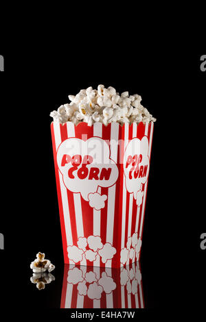 Popcorn in box on black background Stock Photo
