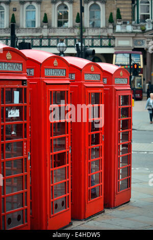 Red telephone box in street with historical architecture in London ...