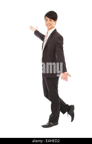 young business man open arms to show something Stock Photo