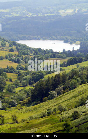 Lake Windermere seen from the top of the Kirkstone pass, looking down the road that links Windermere to Ullswater, Stock Photo