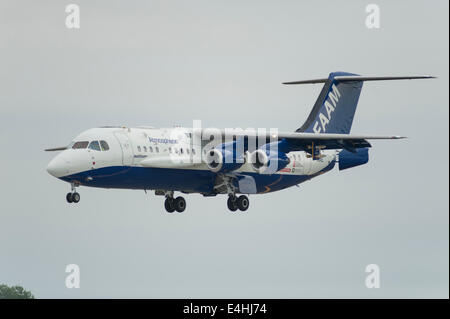 RAF Fairford, Gloucestershire UK. 11th July 2014. BAE 146 Srs 301 FAAM Atmospheric Research Aircraft arrives at RIAT. Credit:  Malcolm Park editorial/Alamy Live News Stock Photo