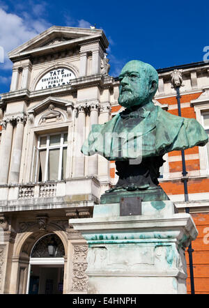 A bust dedicated to Sir Henry Tate situated outside the Tat Public Library in Brixton, London. Stock Photo