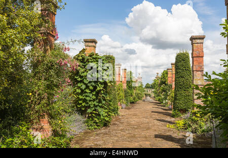 Walled Garden of Sandringham House, Norfolk, UK with path and brickwork pillars Stock Photo
