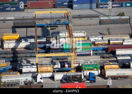 Overhead crane, containers, rail terminal in Port of Barcelona in Catalonia, Spain. Stock Photo