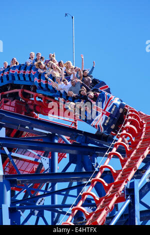 Blackpool, Lancashire, UK, 11 July 2014:  The sun brought out thrill seekers at Blackpool Pleasure Beach this weekend as people cooled off on The Big One. Credit:  Paul Melling/Alamy Live News Stock Photo