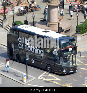 Aerial view Adidas advertising on new London Routemaster Boris bus black with white roof crossing box junction at Bank junction City of London UK Stock Photo