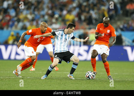(L-R) Nigel de Jong (NED), Lionel Messi (ARG), Bruno Martins Indi (NED), JULY 9, 2014 - Football / Soccer : FIFA World Cup 2014 semi-final match between Netherlands 0(2-4)0 Argentina at Arena De Sao Paulo Stadium in Sao Paulo, Brazil. (Photo by AFLO) [3604] Stock Photo