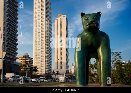 Sculpture of a panther at Green area in Cinta Costera Pacific Ocean Coastal Beltway Bahia de Panama linear park seawall skyline Stock Photo