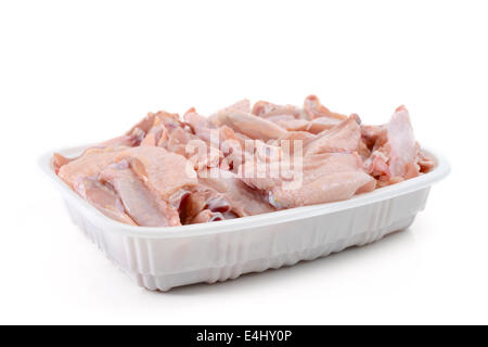 Raw chicken wings on plastic plate Stock Photo