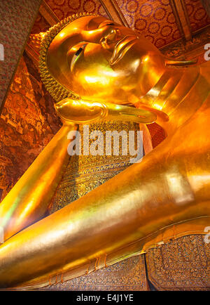 Famous 'Reclining Buddha' statue in the Wat Pho, Bangkok, Thailand Stock Photo