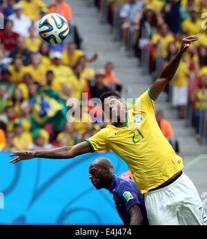 Brasilia, Brazil. 12th July, 2014. Netherlands' Bruno Martins Indi vies with Brazil's Jo during the third place play-off match between Brazil and Netherlands of 2014 FIFA World Cup at the Estadio Nacional Stadium in Brasilia, Brazil, on July 12, 2014. Credit:  Cao Can/Xinhua/Alamy Live News Stock Photo