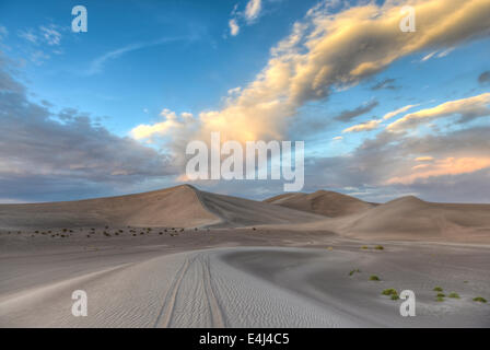 Sand Dunes along the Amargosa Desert at sunset. Located in Nye County in western Nevada, United States. Stock Photo