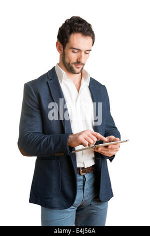 Casual Businessman Looking at a tablet, isolated in white Stock Photo