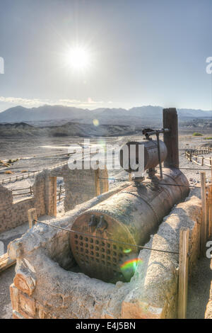 Old wagons and water tank at the Harmony Borax Works where 20 Mule Teams hauled the borax out of Death Valley in the 1880's. Stock Photo