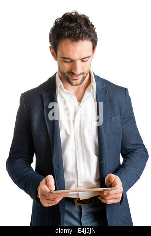 Casual Businessman Looking at a tablet, isolated in white Stock Photo