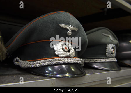 Marietta, GA, USA. 11th July, 2014. Antique military guns show and sale, Marietta GA, where WW2 and other wars' flags, weapons, uniforms, ammunition, etc. are bought and sold between collectors. Pictured: German army officer's cap © Robin Rayne Nelson/ZUMA Wire/Alamy Live News Stock Photo
