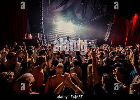 Barcelona, Spain. 12th June, 2014. Festival goers move to the music of Danish multi-instrumentalist, DJ and producer Anders Trentemøller and his band at the SONAR festival in Barcelona - Thousands of international electronic music fans gather at Sonar, a 3-day-long international Festival of Advanced Music and New Media Art, during it's 21st edition with the biggest workshops, concerts and DJ performances in Barcelona. © Matthias Oesterle/ZUMA Wire/ZUMAPRESS.com/Alamy Live News Stock Photo