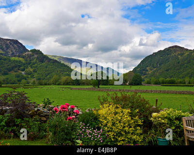 Kings How, Castle Crag,  and Maiden Moor from a pretty garden in Rosthwaite, Borrowdale, Cumbria Stock Photo