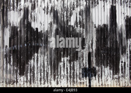 Distressed old corrugated iron fence Stock Photo